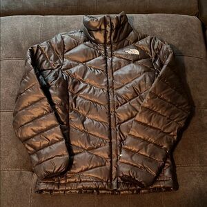 The North Face Black Puffer Jacket with High Collar and Chevron Quilting